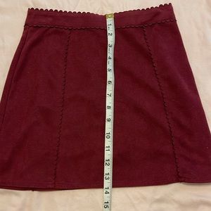 Faux suede scalloped maroon mini skirt